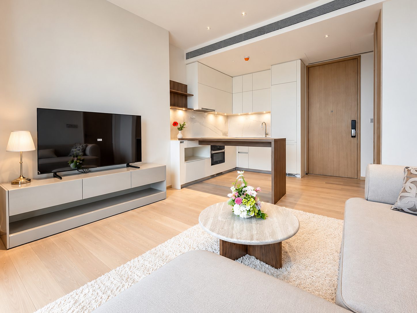 EI8HTEEN SEVEN at One Bangkok: Living room and kitchen